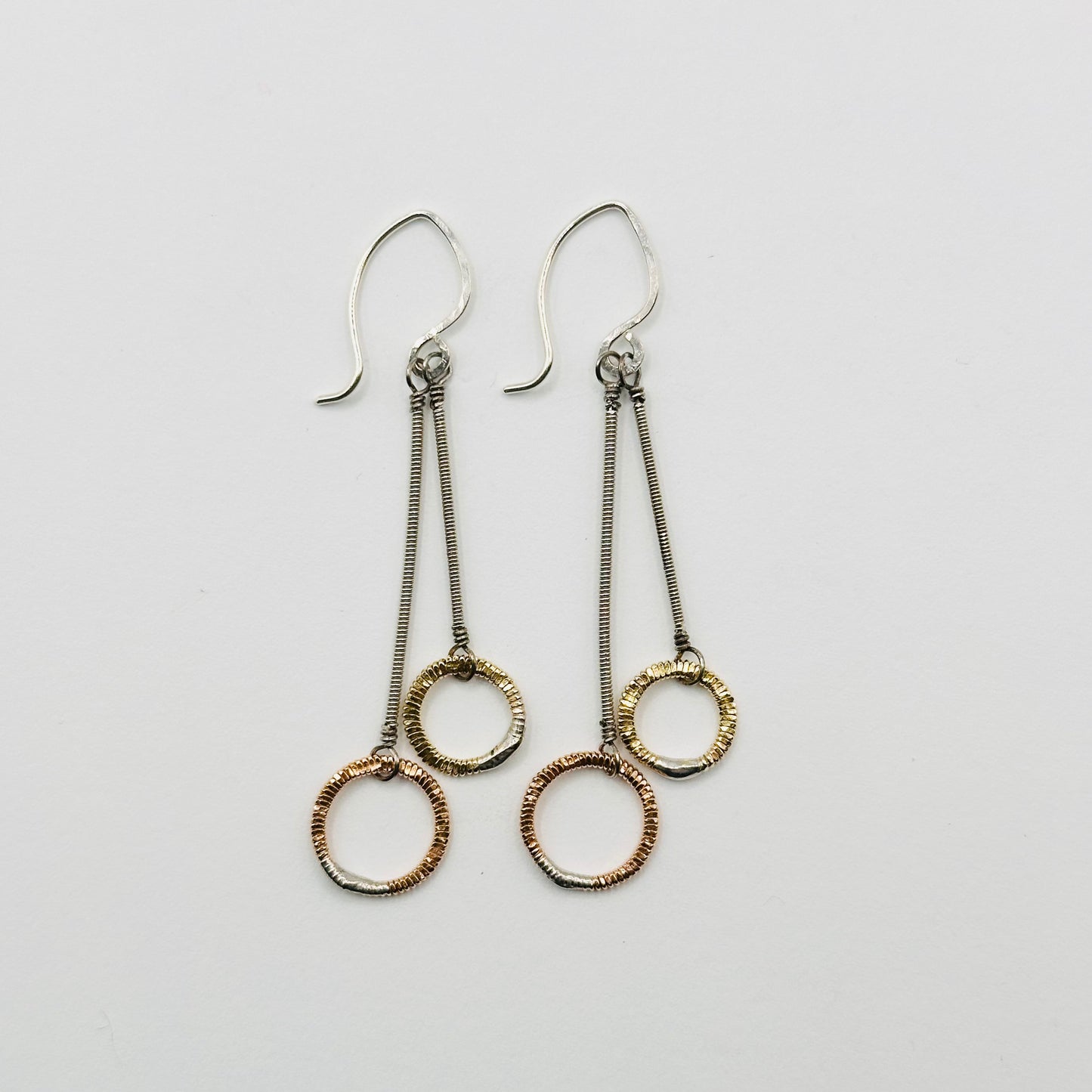 Double Strings with Hammered Circles