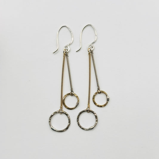 Double Strings with Hammered Circles