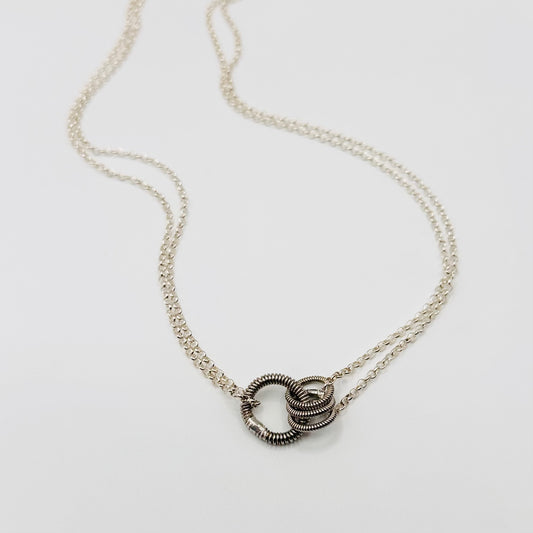 Interlocking Bass String Circles Necklace